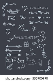 Set of hand drawn valentine's day doodles isolated on chalkboard.