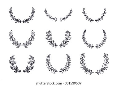 The set of hand drawn vector circular decorative elements for your design. Leaves, swirls, floral elements.