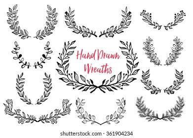 The set of hand drawn vector circular decorative elements for your design. Leaves, swirls, floral elements.