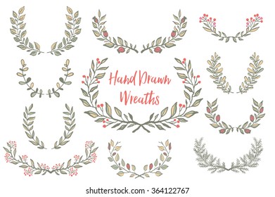 The set of hand drawn vector circular decorative elements for your design. Leaves, swirls, floral elements.