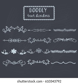 Set of hand drawn vector doodly text dividers isolated on chalkboard.