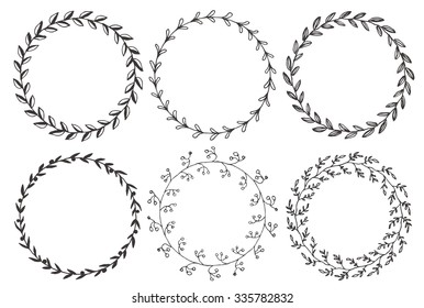 Set of hand drawn vector round floral wreaths. 