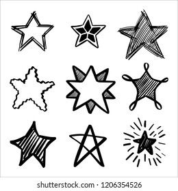 Set of hand drawn vector stars in doodle style on background. Could be used as pattern or standalone element. Brush marker sketchy