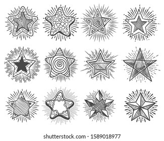 Set of hand drawn vector stars in doodle style on white background. Vector illustration