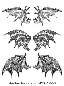 Set of hand drawn vintage etched woodcut fallen angel or vampire detailed wings. Dragon or gargoyle wings. Heraldic wings for tattoo and mascot design. Isolated sketch collection. Vector.