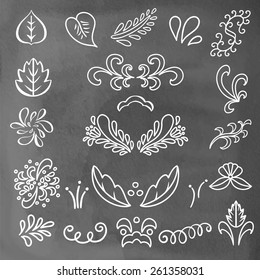 Set hand drawn white lines leaves, waves isolated on chalkboard background. Floral icons. Art logo design