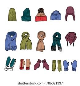 Set of hand drawn winter accesories: caps, gloves and scarfs in color. Isolated vector illustration