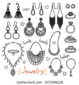 Set of hand drawn women accessories. Jewelry - earrings, rings, necklaces. Fashion collection. Black and white doodle illustration.