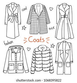 Set of hand drawn women clothes. Coats. Fashion collection. Black and white doodle illustration.