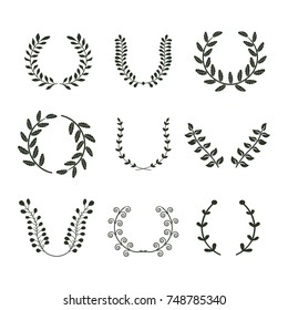 Set of hand drawn wreaths on white background. Vector illustration.