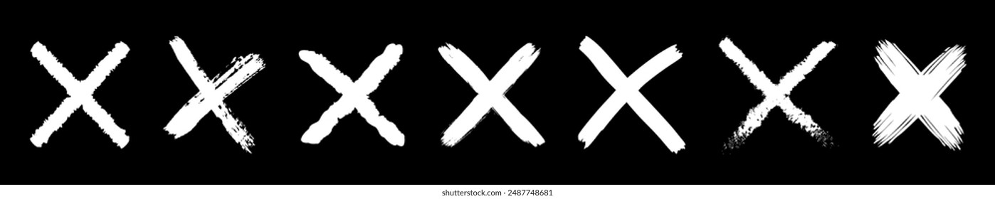 Set of hand drawn X Marks. Crossed brush stroke. Cross sign graphic symbol.