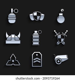 Set Hand grenade, Chevron, Cannon, Medieval shield with crossed swords, Japanese ninja shuriken, Viking horned helmet, Bomb ready to explode and  icon. Vector