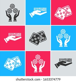 Set Hand holding casino chips, Hand holding deck of playing cards and Game dice icon. Vector