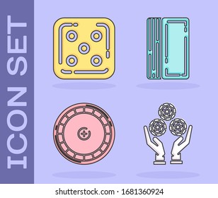Set Hand holding casino chips, Game dice, Casino roulette wheel and Deck of playing cards icon. Vector