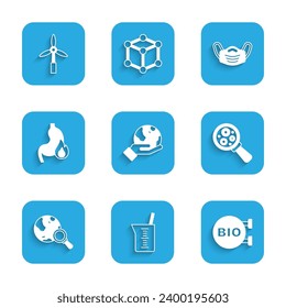 Set Hand holding Earth globe, Bio healthy food, Microorganisms under magnifier, Magnifying with, Stomach heartburn, Medical protective mask and Wind turbine icon. Vector