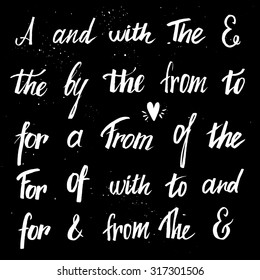 Set of hand lettered ampersands and catchwords ( at, to, for, the, of, with, by, and, from) . Design elements  for invitations, greeting cards, quotes, blogs, posters and more. Vector.