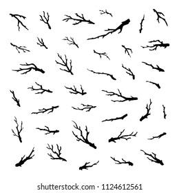 Set of hand painted black ink tree branches and twigs isolated on white background.