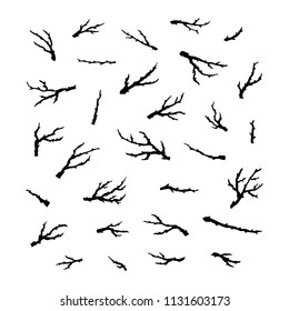 Set of hand painted black ink tree branches and twigs isolated on white background.