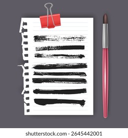 Set of hand painted brush strokes on white piece of notebook