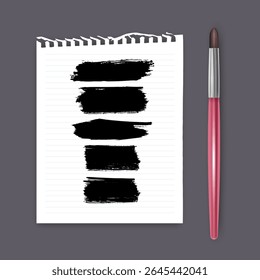 Set of hand painted brush strokes on white piece of notebook