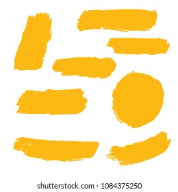 Set of Hand Painted Golden Brush Strokes. Gold Vector Grunge Brushes. Vector Frame For Text Modern Art Graphics For Hipsters.  Dirty Artistic Creative Design Elements. Perfect For Logo, Banner.
