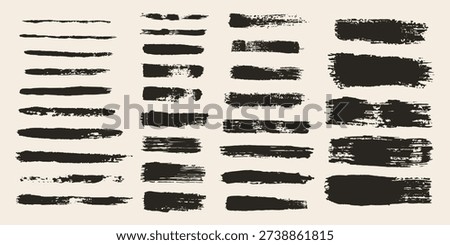Set of hand painted gouache brush strokes and long ink lines. Grunge textures, smears, and dry brush effects. Isolated artistic black elements for borders, underlining, and creative design projects.