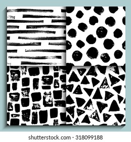 Set of Hand painted seamless tribal geometrical shapes pattern. Modern trendy fashion backgrounds.