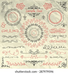Set of Hand Sketched Colorful Doodle Design Elements on Crumpled Paper Texture. Decorative Floral Swirls, Scrolls, Text Frames, Dividers. Vintage Vector Illustration. Pen Drawing. 