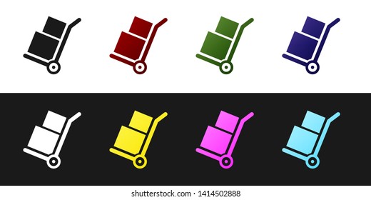 Set Hand truck and boxes icon isolated on black and white background. Dolly symbol. Vector Illustration