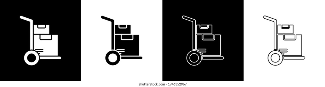 Set Hand truck and boxes icon isolated on black and white background. Dolly symbol.  Vector Illustration