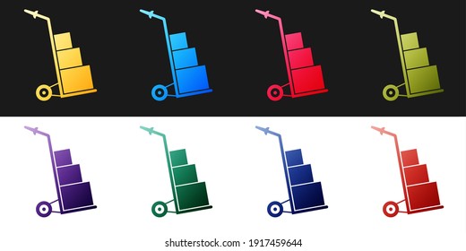Set Hand truck and boxes icon isolated on black and white background. Dolly symbol. Vector.