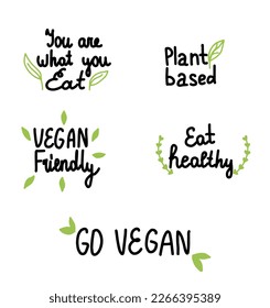 Set of hand written vegan slogans, inscription, go vegan, vegan friendly, plant based labels, isolated on white background