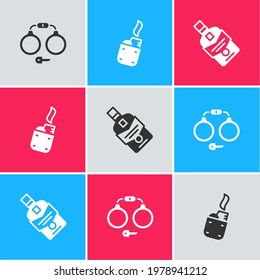 Set Handcuffs, Lighter and Whiskey bottle icon. Vector