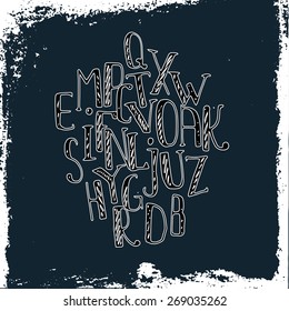 Set of hand-drawn alphabetical letters on a grunge dark background