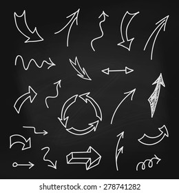Set of hand-drawn arrows on chalkboard background. Infographic elements. Vector illustration