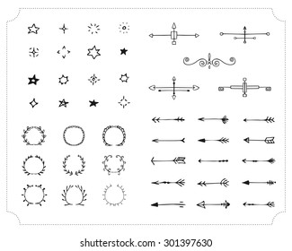 Set of hand-drawn black handle elements. Decorative design elements. Arrows,  stars, lights, laurel wreaths, . Vector.