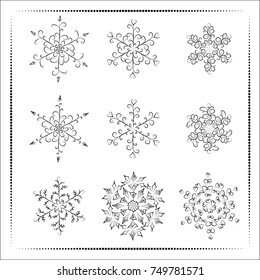 Set of hand-drawn blue snowflake with curls composed of discontinuous dots