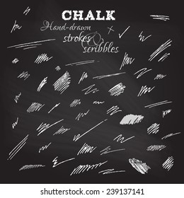 Set of hand-drawn chalk strokes and scribbles. Various shapes on blackboard. Vector illustration.