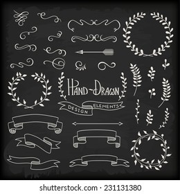 set of hand-drawn design elements on chalkboard