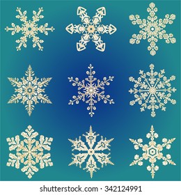 Set hand-drawn doodles gold colored snowflake Festive seamless pattern. Vector illustration