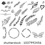Set of hand-drawn floral elements, leaves and hearts. Vector doodles. 