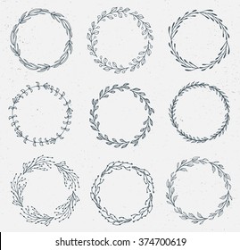 Set of Handdrawn ink painted floral frames, wreaths and laurels. Vintage vector clipart set for wedding, holiday and greeting cards, web, prind scrapbooking  design and other