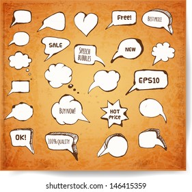 Set of hand-drawn ink speech and thought bubbles on vintage background.  Pen sketch. Doodle vector illustration. 