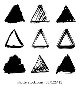 Set of hand-drawn ink triangles. Vector illustration. Isolated.