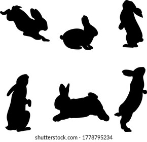 Set of hand-drawn running, looking up and sitting in various poses rabbits black silhouette . Set of Easter bunny outlines isolated on white background. Simple cartoon bunny.