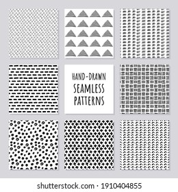 Set of hand-drawn seamless black and white patterns. Vector simple modern grunge backgrounds.