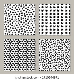 Set of hand-drawn seamless black and white patterns. Vector simple modern grunge backgrounds.