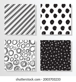 Set of hand-drawn seamless black and white textures in vector repeat patterns. Doodles and scribbles.
