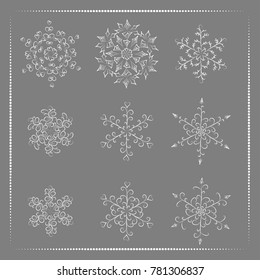 Set of hand-drawn snowflake with curls composed of discontinuous dots