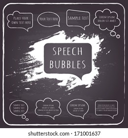 Set of hand-drawn speech and thought bubbles with sample text  on chalkboard background. Vector illustration. 